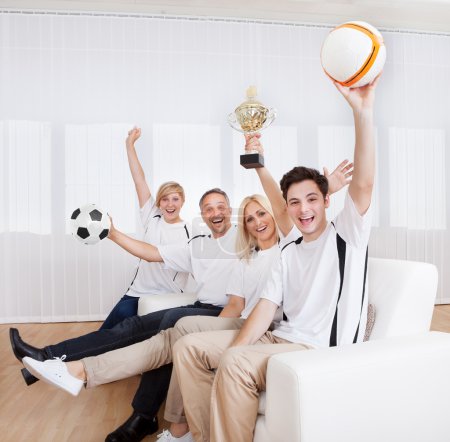 Ecstatic family celebrating a win